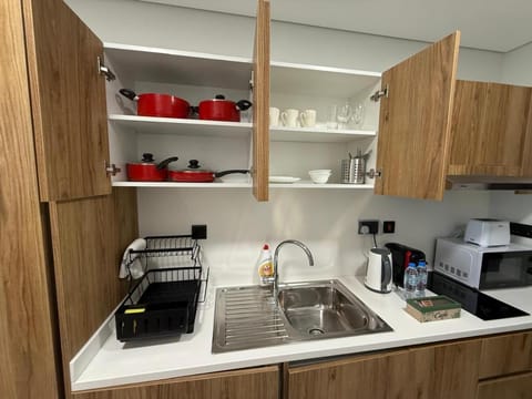 Kitchen or kitchenette, stove, toaster