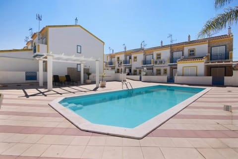 Property building, Living room, Swimming pool