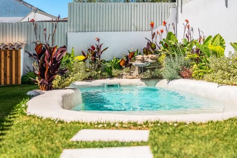 Property building, Living room, Swimming pool