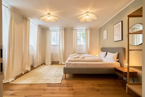 Bed, People, People, View (from property/room), Photo of the whole room, Decorative detail, Decorative detail, Bedroom, internet, internet, towels, wardrobe