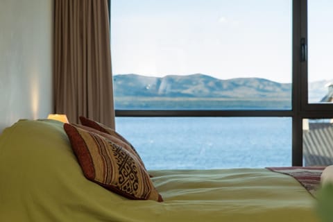 Bed, Natural landscape, Decorative detail, Bedroom, Lake view, Mountain view