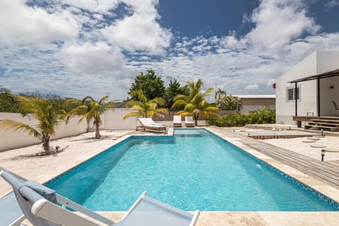 Patio, Day, Natural landscape, Pool view, Swimming pool, sunbed