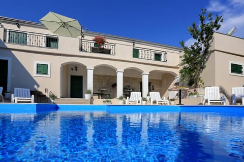 Facade/entrance, Swimming pool