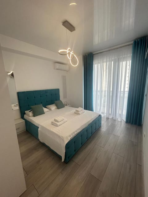 Bed, Photo of the whole room, Bedroom, towels, air conditioner