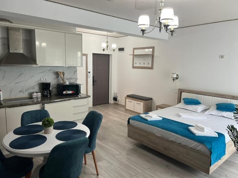 Bed, Kitchen or kitchenette, Living room, Photo of the whole room, Seating area, Dining area, Bedroom, stove, towels