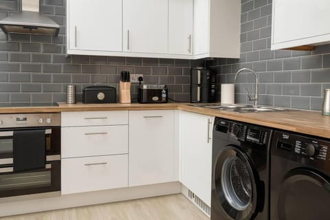 Coffee/tea facilities, washing machine, dryer, kitchen