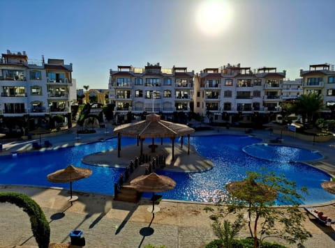 Property building, Pool view, Swimming pool, sunbed