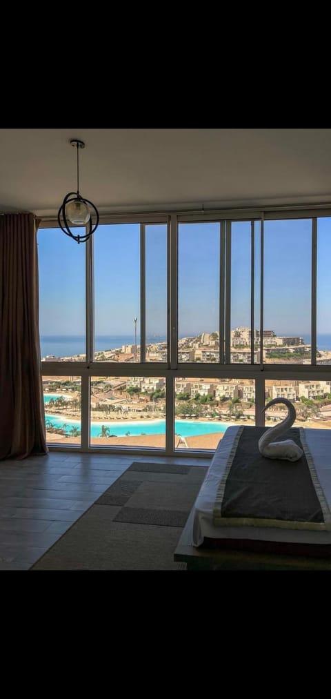 Bed, Natural landscape, View (from property/room), Pool view, Sea view, Swimming pool