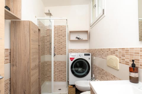 Shower, Bathroom, towels, washing machine, dryer