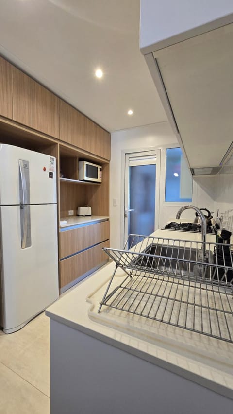 Kitchen or kitchenette, oven, stove