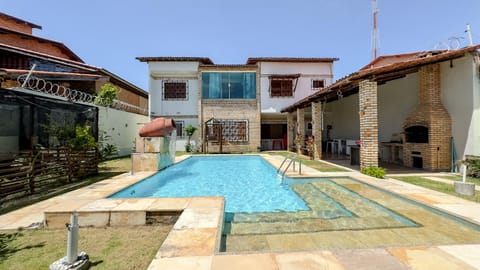 Property building, BBQ facilities, Pool view