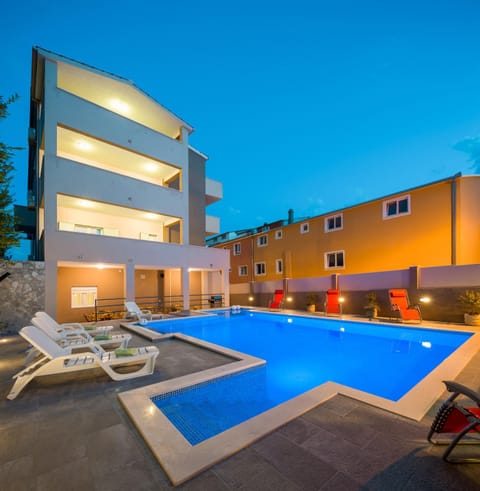 Property building, Night, Pool view, Swimming pool, Swimming pool