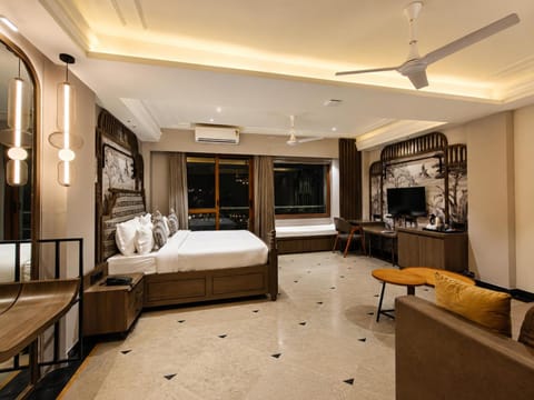 Communal lounge/ TV room, Bed, TV and multimedia, Living room, Photo of the whole room, Seating area, Evening entertainment, Bedroom, fireplace, air conditioner