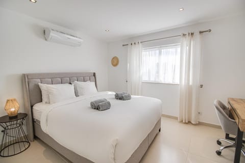 Bed, Photo of the whole room, Bedroom, towels, air conditioner