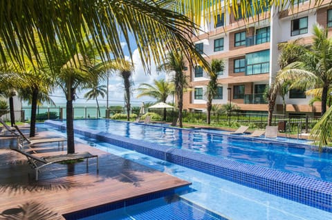 Property building, Nearby landmark, Restaurant/places to eat, Communal lounge/ TV room, Off site, Neighbourhood, Activities, BBQ facilities, Garden, Library, Balcony/Terrace, Lobby or reception, Fitness centre/facilities, Fitness centre/facilities, Banquet/Function facilities, Beach, Animals, Communal kitchen, On site, Pool view, Pool view, Area and facilities, Supermarket/grocery shop, Shopping Area, Swimming pool, Swimming pool, Location