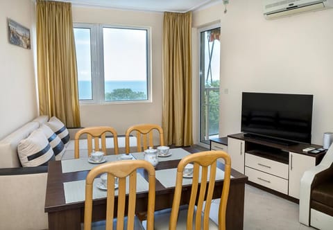 Natural landscape, TV and multimedia, Living room, Seating area, Dining area, Sea view, air conditioner