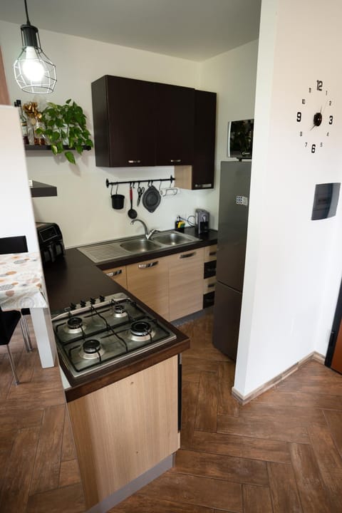 Kitchen or kitchenette, stove