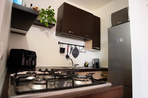 Kitchen or kitchenette, stove