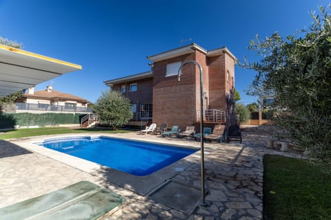 Property building, Living room, Swimming pool