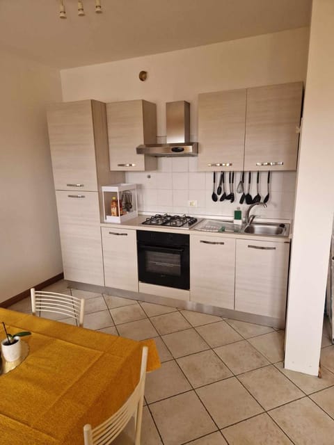 Kitchen or kitchenette, oven, stove
