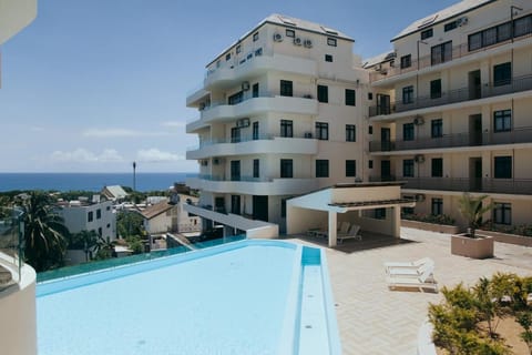 View (from property/room), Pool view, Sea view, Swimming pool