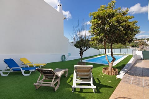 Property building, Living room, Swimming pool