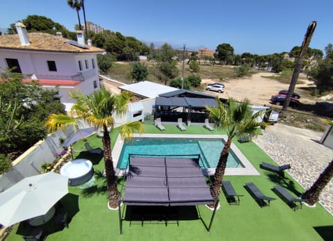 Property building, Patio, Spring, Day, Natural landscape, Garden, Pool view, Parking, sunbed