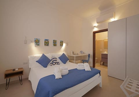 Bed, Photo of the whole room, Bedroom, towels, wardrobe