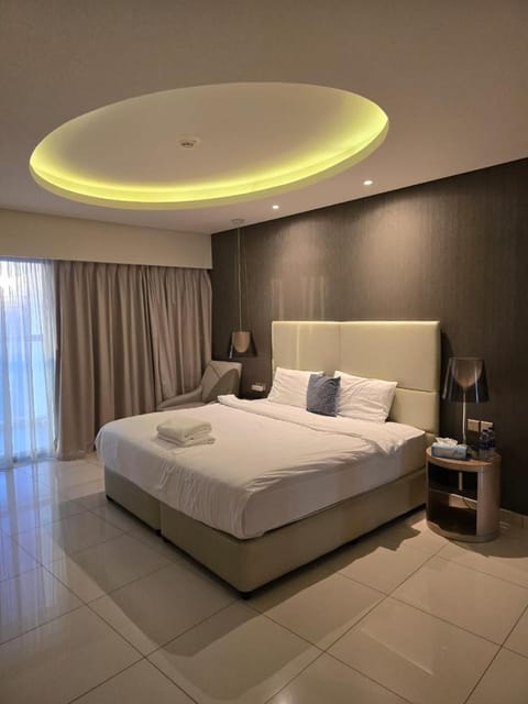 Bed, Living room, Seating area, Bedroom, towels
