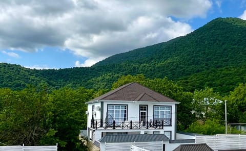 Property building, Nearby landmark, Spring, Day, Natural landscape, Mountain view