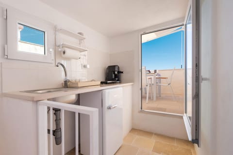 Kitchen or kitchenette, stove