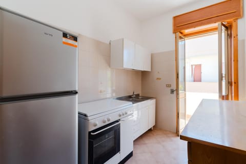 Kitchen or kitchenette, oven, stove