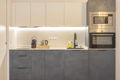 Kitchen or kitchenette, stove, toaster