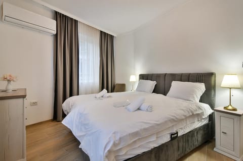 Bed, Photo of the whole room, Bedroom, towels, air conditioner