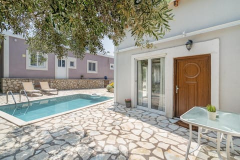 Property building, Living room, Swimming pool