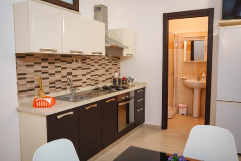 Kitchen or kitchenette, oven, stove