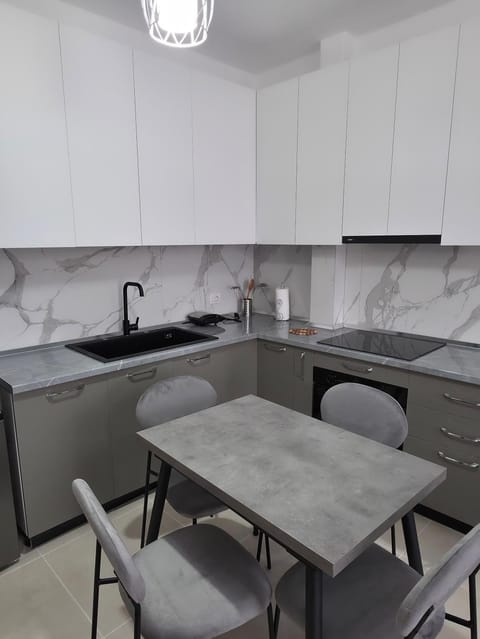 Kitchen or kitchenette, Living room, Seating area, Dining area, stove