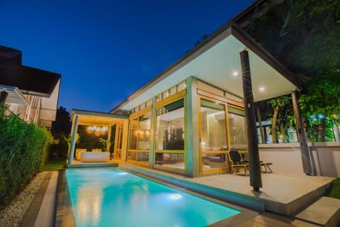Property building, Patio, Night, Pool view, Swimming pool