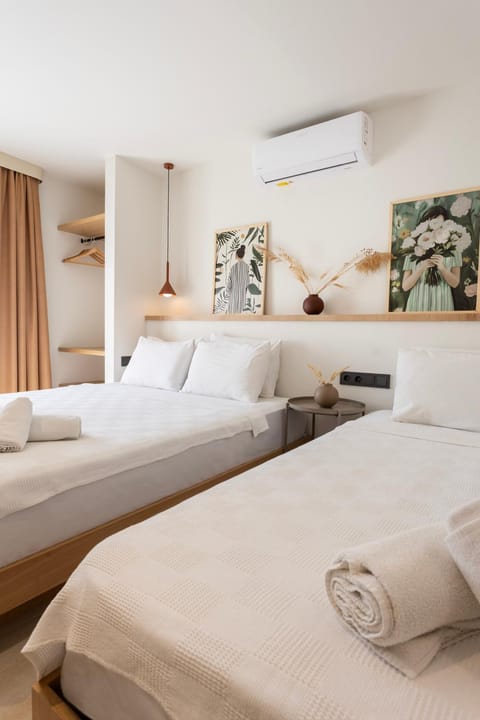 Bed, Photo of the whole room, Bedroom, towels, air conditioner