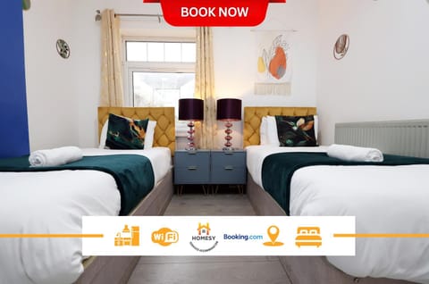 Bed, Property logo or sign, Photo of the whole room, Logo/Certificate/Sign, Bedroom, Text overlay, Certificate/Award