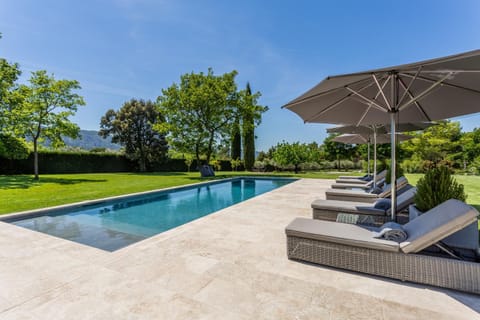 Patio, Natural landscape, Garden, Swimming pool, sunbed