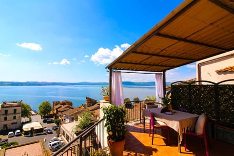 Property building, Day, Natural landscape, View (from property/room), Balcony/Terrace, Dining area, Sea view