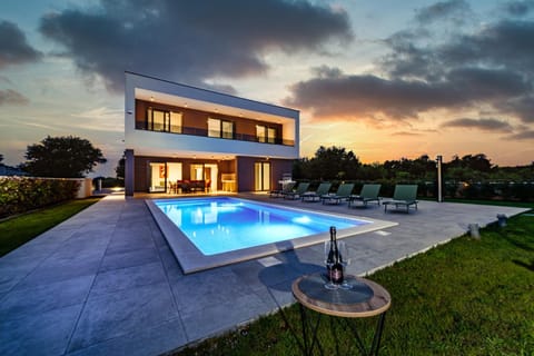 Property building, Night, Swimming pool