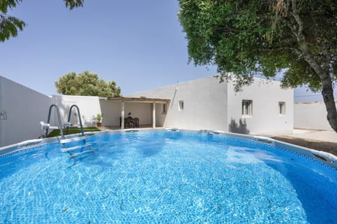 Property building, Living room, Swimming pool