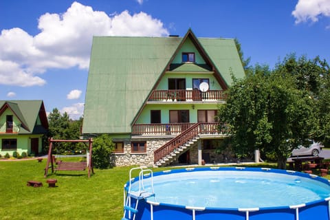 Property building, Day, Natural landscape, Summer, Garden, Garden view, Pool view, Swimming pool