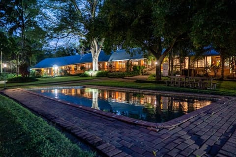Property building, Night, Garden, Garden view, Pool view, Swimming pool