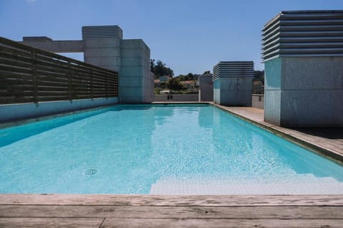 Piscina y garaje cerca del centro by CABANA Rentals Apartment in Vigo
