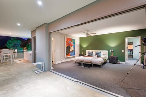 Patio, Bed, Hot Tub, Photo of the whole room, Seating area, Bedroom