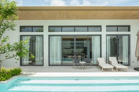 Property building, Pool view, Swimming pool, sunbed