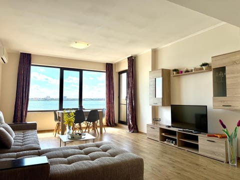 Communal lounge/ TV room, Natural landscape, TV and multimedia, View (from property/room), Living room, Seating area, Sea view